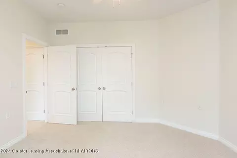 Bedroom - 6031 E Lake Dr, Haslett, MI 48840 photo 4 of 6