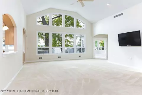 Living - 6031 E Lake Dr, Haslett, MI 48840 photo 1 of 7
