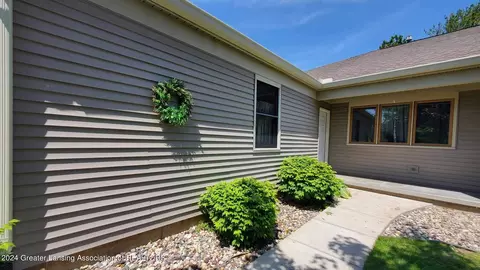 Exterior - 7230 Creekside Dr, Lansing, MI 48917 photo 3 of 4