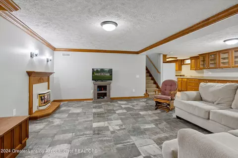 Living - 9948 Riverside Dr, Eagle, MI 48822 photo 1 of 2