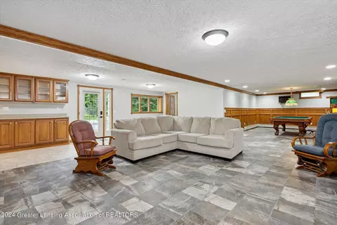 Living - 9948 Riverside Dr, Eagle, MI 48822 photo 2 of 2