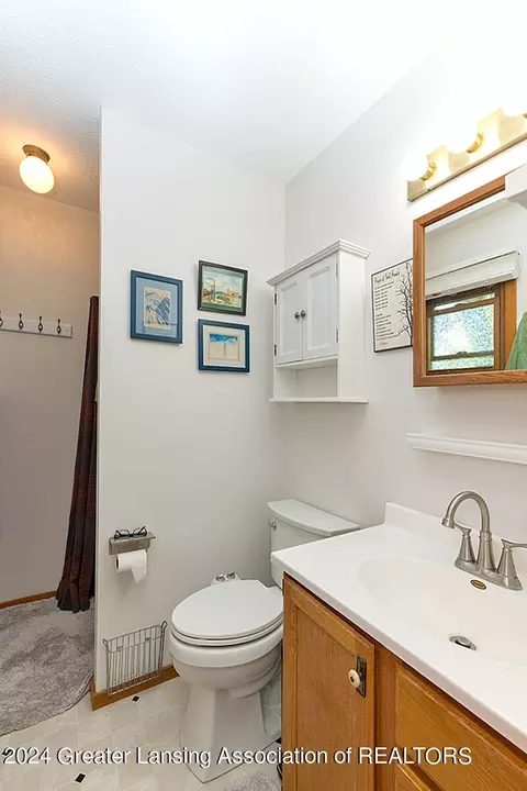 Bath - 6833 E Howe Rd, Bath, MI 48808 photo 1 of 3