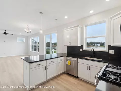 Kitchen - 621 Launch Point Dr, Perry, MI 48872 photo 6 of 6