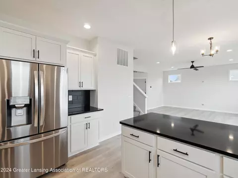 Kitchen - 621 Launch Point Dr, Perry, MI 48872 photo 5 of 6