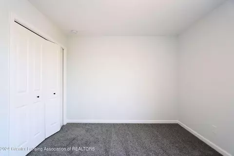 Bedroom - 621 Launch Point Dr, Perry, MI 48872 photo 9 of 13