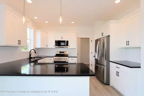 Kitchen - 621 Launch Point Dr, Perry, MI 48872 photo 1 of 6