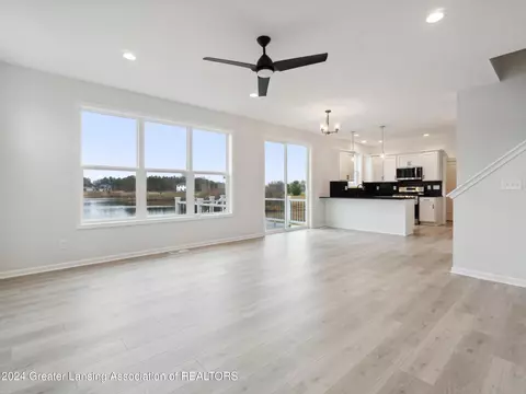 Living - 621 Launch Point Dr, Perry, MI 48872 photo 6 of 7