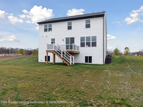 Exterior - 621 Launch Point Dr, Perry, MI 48872 photo 6 of 9