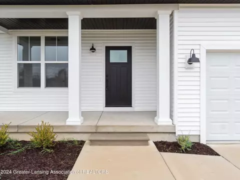 Exterior - 621 Launch Point Dr, Perry, MI 48872 photo 5 of 9