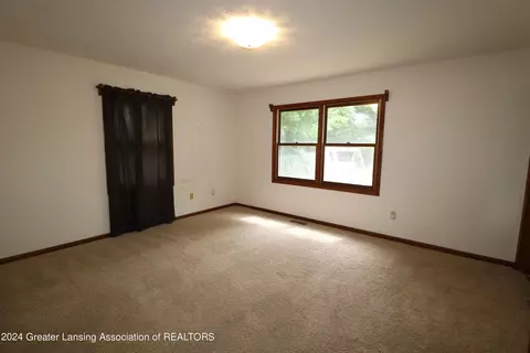 Bedroom - 2404 Pine Tree Rd, Holt, MI 48842 photo 1 of 4