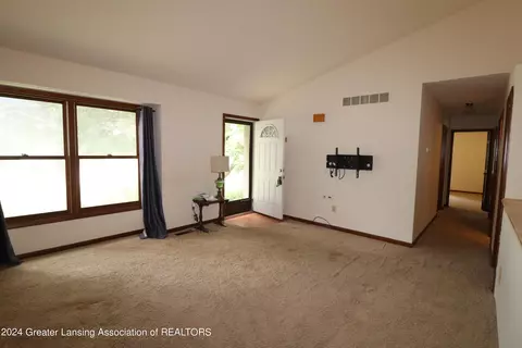 Living - 2404 Pine Tree Rd, Holt, MI 48842 photo 1 of 3