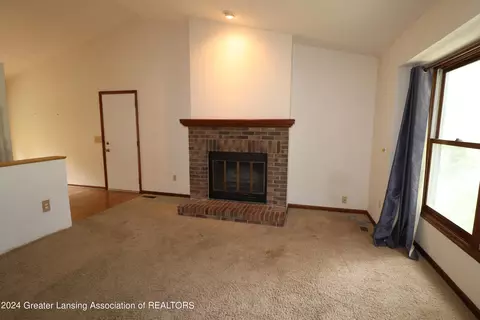 Living - 2404 Pine Tree Rd, Holt, MI 48842 photo 3 of 3