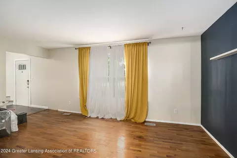 Living - 6443 Bluejay Dr, Flint, MI 48506 photo 2 of 3