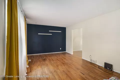 Living - 6443 Bluejay Dr, Flint, MI 48506 photo 3 of 3