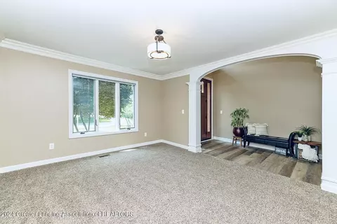 Living - 13355 Speckledwood Dr, Dewitt, MI 48820 photo 2 of 2