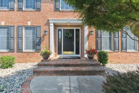 Exterior - 1003 Sandhill Dr, Dewitt, MI 48820 photo 4 of 14