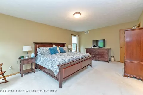 Bedroom - 303 Rivergate Ln, Dewitt, MI 48820 photo 2 of 5