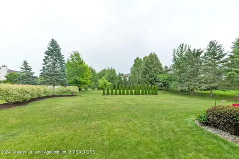 Exterior - 303 Rivergate Ln, Dewitt, MI 48820 photo 2 of 2