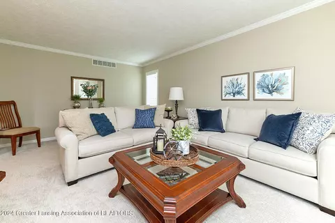 Living - 303 Rivergate Ln, Dewitt, MI 48820 photo 1 of 2