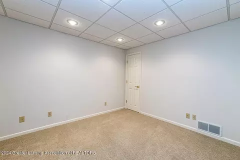 Bedroom - 303 Rivergate Ln, Dewitt, MI 48820 photo 5 of 5