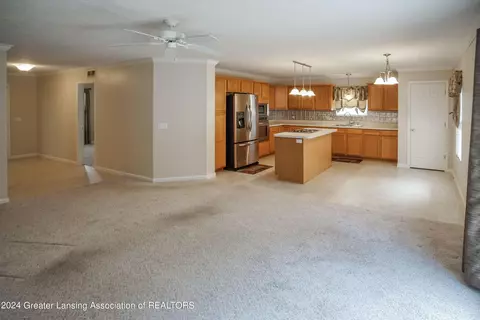 Living - 7745 Taragreen Dr, Lansing, MI 48917 photo 1 of 5