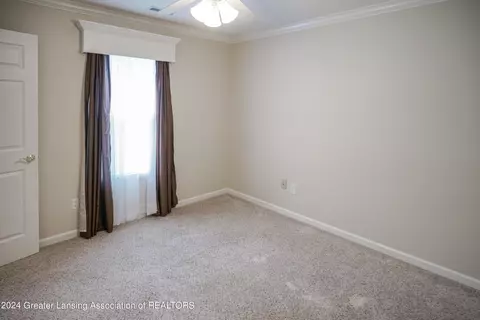 Bedroom - 7745 Taragreen Dr, Lansing, MI 48917 photo 10 of 12