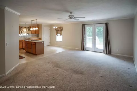 Living - 7745 Taragreen Dr, Lansing, MI 48917 photo 2 of 5