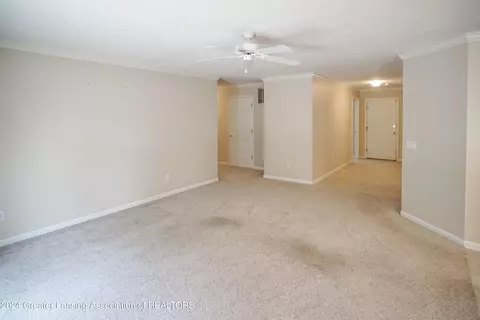 Living - 7745 Taragreen Dr, Lansing, MI 48917 photo 5 of 5