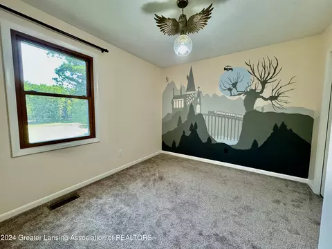 Bedroom - 730 Tanbark Dr, Dimondale, MI 48821 photo 7 of 10