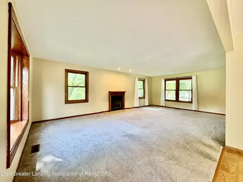 Living - 730 Tanbark Dr, Dimondale, MI 48821 photo 7 of 8