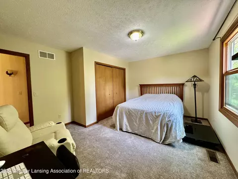 Bedroom - 730 Tanbark Dr, Dimondale, MI 48821 photo 8 of 10