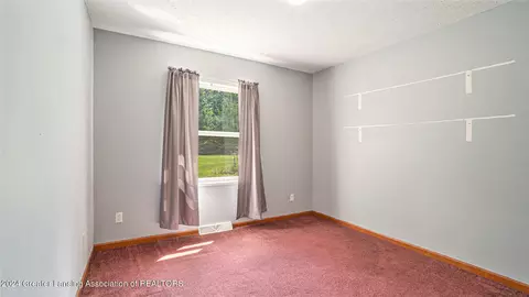 Bedroom - 5501 E Haskell Lake Rd, Harrison, MI 48625 photo 6 of 6