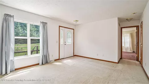 Living - 5501 E Haskell Lake Rd, Harrison, MI 48625 photo 4 of 4