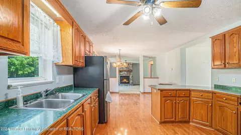 Kitchen - 5501 E Haskell Lake Rd, Harrison, MI 48625 photo 3 of 3