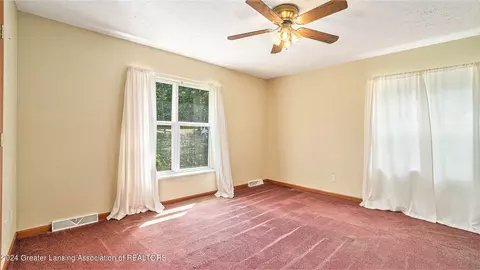 Bedroom - 5501 E Haskell Lake Rd, Harrison, MI 48625 photo 2 of 6