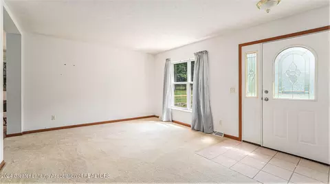 Living - 5501 E Haskell Lake Rd, Harrison, MI 48625 photo 2 of 4