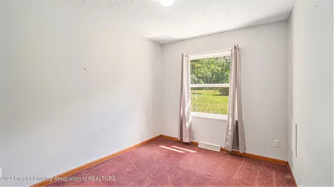 Bedroom - 5501 E Haskell Lake Rd, Harrison, MI 48625 photo 5 of 6