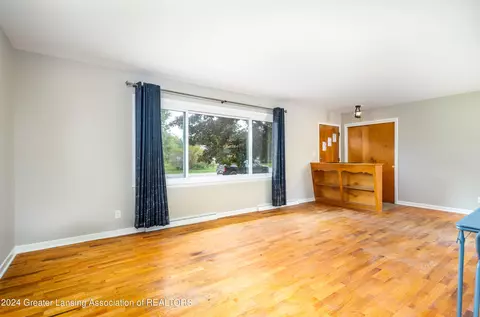 Living - 706 Arbor Vitae Dr, Lansing, MI 48917 photo 2 of 2