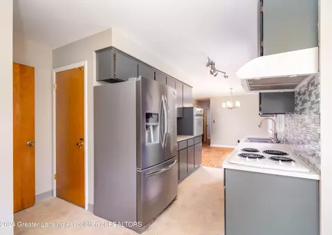 Kitchen - 706 Arbor Vitae Dr, Lansing, MI 48917 photo 2 of 2