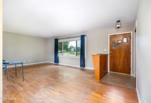 Living - 706 Arbor Vitae Dr, Lansing, MI 48917 photo 1 of 2