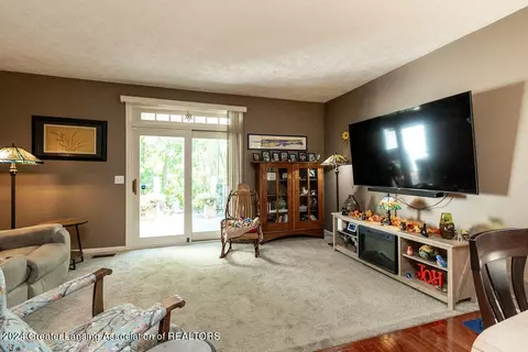 Living - 5696 Shaw St #12, Haslett, MI 48840 photo 1 of 2