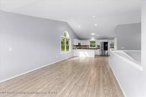 Living - 1246 Keusch Dr, Dewitt, MI 48820 photo 3 of 5