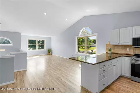 Living - 1246 Keusch Dr, Dewitt, MI 48820 photo 2 of 5