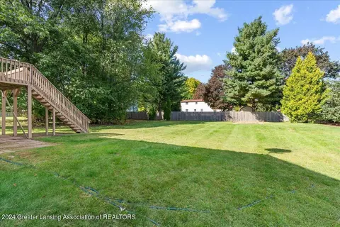 Exterior - 1246 Keusch Dr, Dewitt, MI 48820 photo 7 of 11