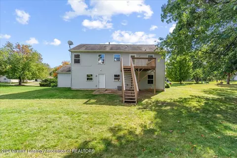 Exterior - 1246 Keusch Dr, Dewitt, MI 48820 photo 3 of 11