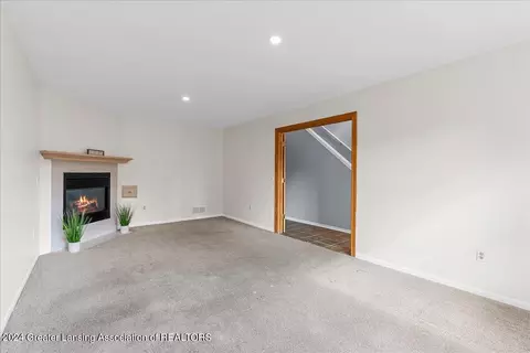 Living - 1246 Keusch Dr, Dewitt, MI 48820 photo 4 of 5