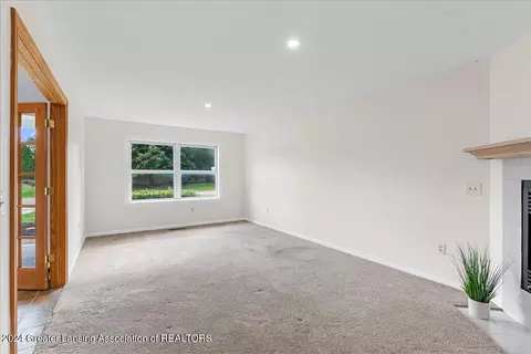 Living - 1246 Keusch Dr, Dewitt, MI 48820 photo 5 of 5