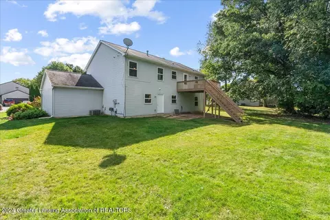 Exterior - 1246 Keusch Dr, Dewitt, MI 48820 photo 9 of 11