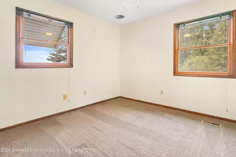 Bedroom - 1510 W Pratt Rd, Dewitt, MI 48820 photo 6 of 9