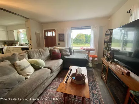 Living - 801 E Cavanaugh Rd, Lansing, MI 48910 photo 1 of 2